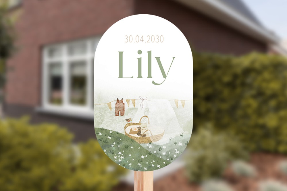 Geboorte tuinbord ovaal lente wiegje in het gras Lily